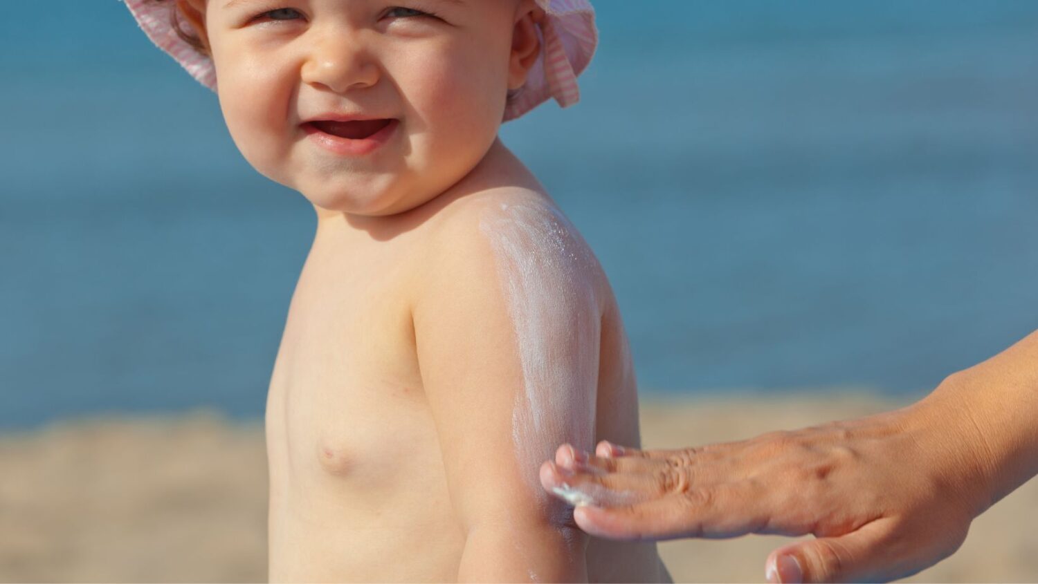 come applicare la crema solare ai bambini